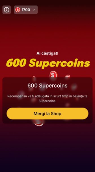 Superbet SuperSpin, pop-up de câștig cu 600 Supercoins, balanță de 1700 Supercoins și buton „Mergi la Shop” pentru accesarea recompenselor