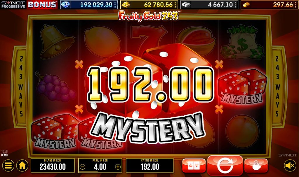 Ecran cu funcția Mystery la slotul Fruity Gold 243 de la SYNOT, în modul demo, cu un câștig de 192 RON, simboluri cu zaruri roșii Mystery și 243 de moduri de câștig. Sunt afișate pariul de 4 RON, soldul de 23.430 RON și butonul Spin.